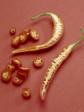 A Halved Chili Pepper and Slices of Chili