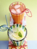 Ice-Cold Lemonade and Pink Grapefruit Juice in Glasses