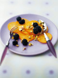 Sharon Fruit Slices with Blackberries and Pistachios