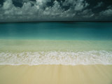 Wave Rolls over a Tranquil Beach in the Marshall Islands