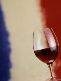 A Glass of Red Wine in Front of the French Flag