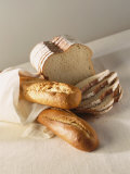 Partly Sliced Bread and Baguettes