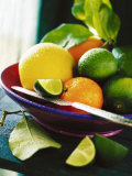 A Selection of Citrus Fruits in a Bowl