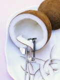 Making Coconut Shavings with a Vegetable Peeler