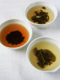 Three Bowls of Different Types of Tea
