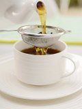 Pouring Tea Through a Tea Strainer