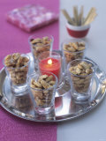 Salted Almonds and Candle on Silver Tray