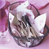 Silver Cutlery in a Wire Basket
