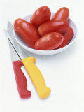 Plum Tomatoes in a Dish  Two Kitchen Knives