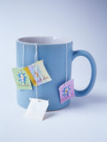 Several Tea Bags in a Mug