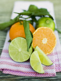 Clementines and Limes with Leaves
