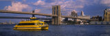 Water Taxi in a River  Brooklyn Bridge  East River  New York City  New York  USA