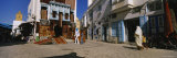 Four People Walking on the Street  Medina  Kairwan  Tunisia