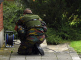 Soldier of the Belgian Army Investigating Suspect Building