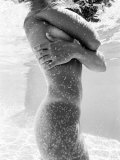 Sensual Nude Woman Standing in Swimming Pool