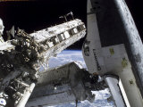 Space Shuttle Discovery Docked to the International Space Station