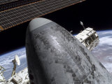 Space Shuttle Discovery Docked to the International Space Station