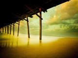 Pier over Calm Waters and Golden Sand