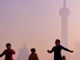 Tai Chi Exercises at Sunrise  the Bund  Shanghai China