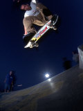 Skateboarder Doing a Maneuver in the Air