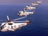 Navy Helicopters Flying Over the Ocean