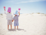 2 Boys with Sand Bucket Over Their Heads