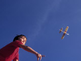 Boy Flying Toy Airplane