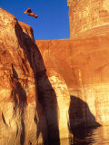 Person Jumping off Cliff