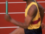 Sprinter Running with Baton