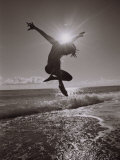 Silhouette of Dancer Jumping Over Atlantic Ocean