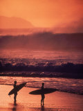 Surfers at Sunset  Oahu  Hawaii