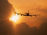 Jumbo Jet Banking Into Sunset