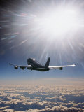 Airplane Flying Through Clouds