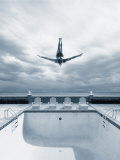 Man Diving Into an Empty Pool
