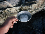 Hiker Getting a Cool Cup of Water