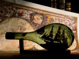 An Antique Map Provides the Backdrop for a Ship in a Bottle