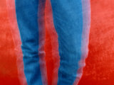 Vibrant Blue Jeans against a Red Background