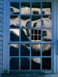 Reflections on the Panes of a Weathered Window