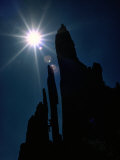 A Climber Chimneys Between Two Granite Spikes
