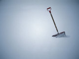 Deep Snow and a Lone  Well-Used Shovel