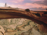 Mountain-Biking over a Natural Arch