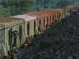 Moving Mountains of Coal by Hand  Laborers Load Boxcars in Ledo