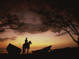 Horseback Rider Silhouetted on a Beach at Twilight  Costa Rica