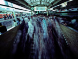 Commuters Crowd a Subway Platform in Japan