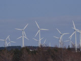 Windmills Wait to Catch a Breeze on a Hilltop