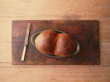 Bread Laid out on a Simple Table Setting