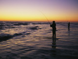 People are Surf Fishing for Red Drum on the Outer Banks of North Carolina