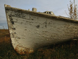 A Wooden Boat Lies Abandoned at the Hay River Shipyard
