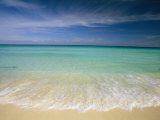 Clear Blue Water and Wispy Clouds Along the Beach at Cancun