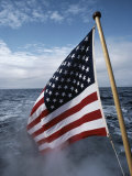An American Flag Flutters from the Back of a Boat in Neah Bay